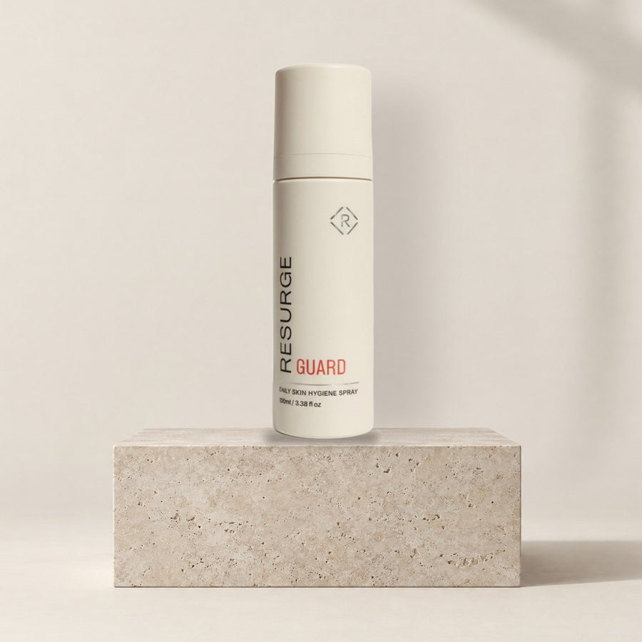 Resurge GUARD daily skin hygiene spray 100ml on a stone plinth