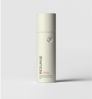 Skincare bottle labeled 'Resurge Guard' on a light gray background