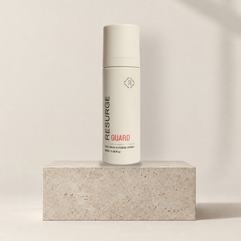 Resurge GUARD daily skin hygiene spray 100ml on a stone plinth